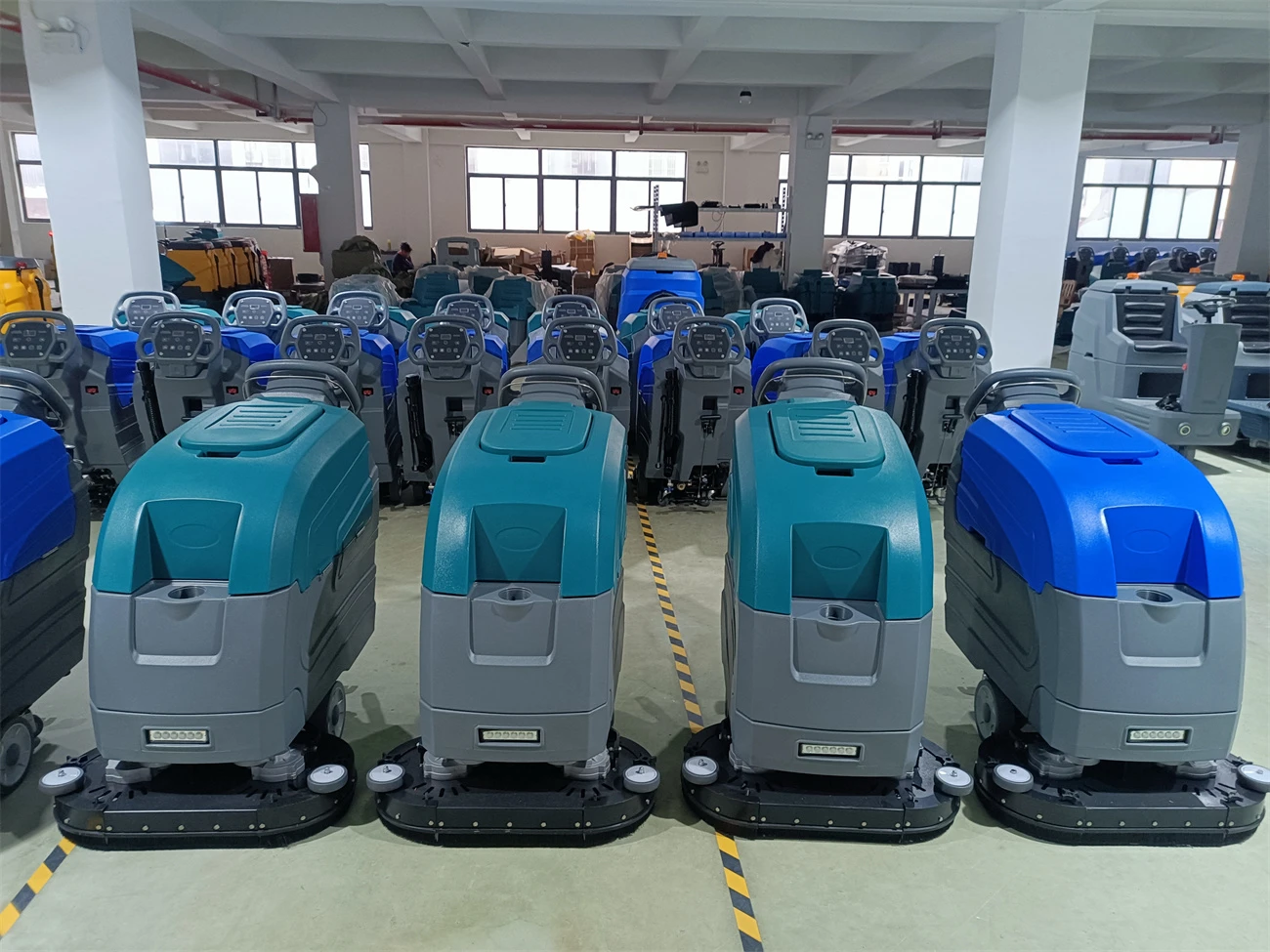 What should I do if the water discharge from the driving scrubber is abnormal